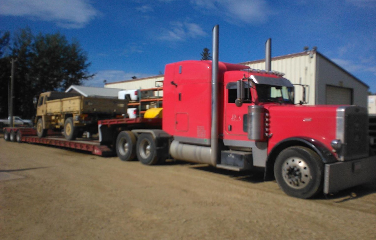 Having agreed the purchase, Eva is loaded on to a low loader ready for her trip south, across the US border.